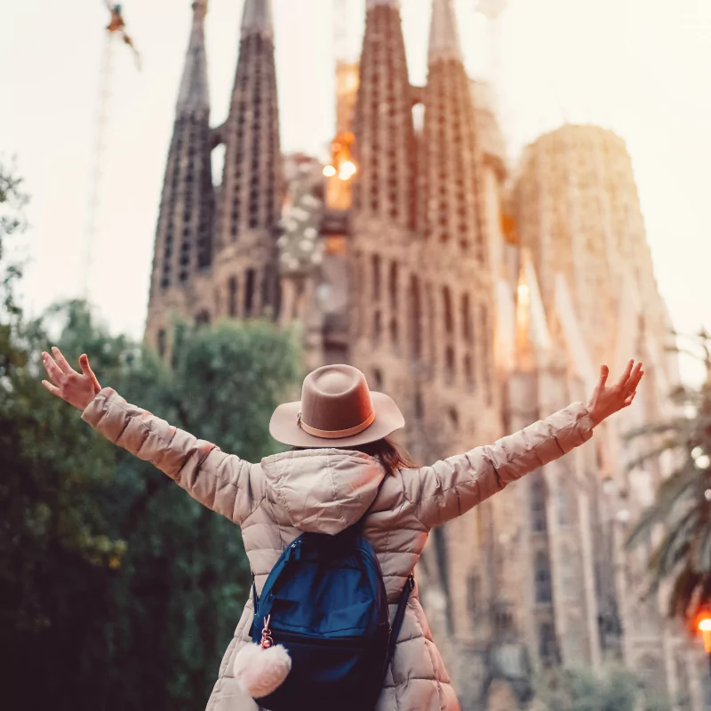 sagrada familia and woman posing